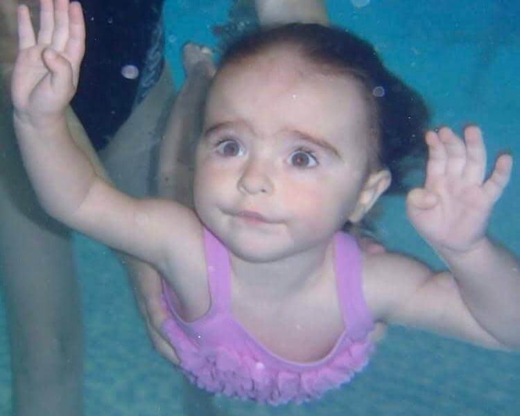 Girl enjoying a swimming lesson at Dalston Leisure Pool in Carlisle